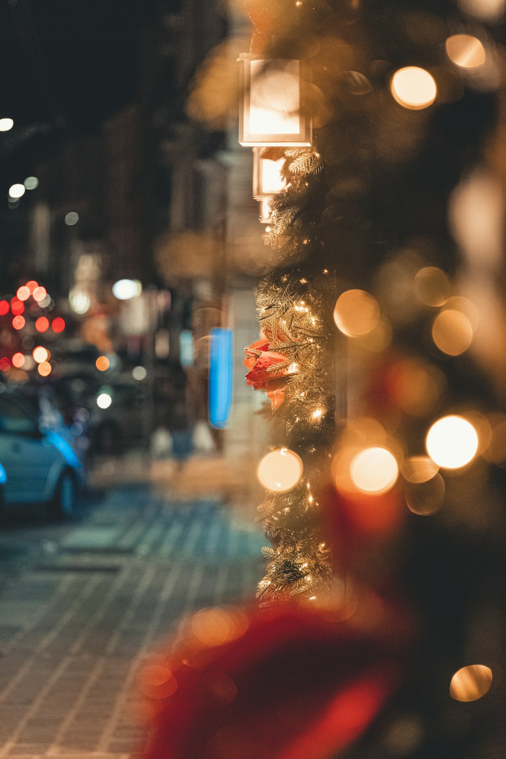 a view of a street at night from a window