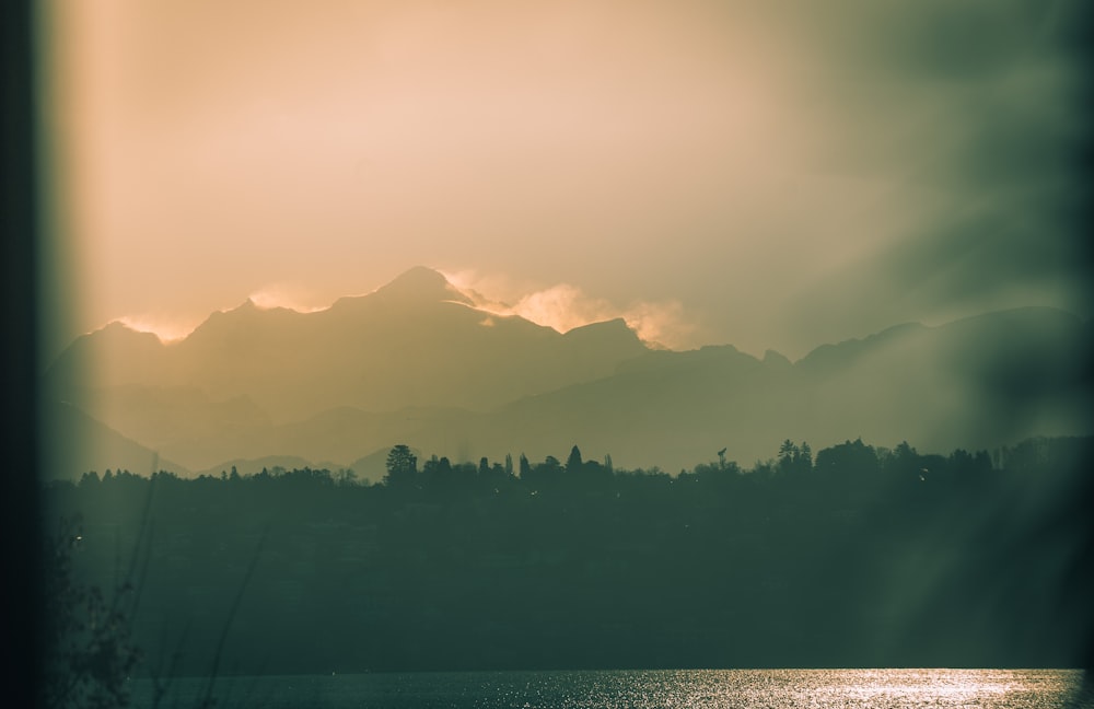 a view of a mountain range through a window