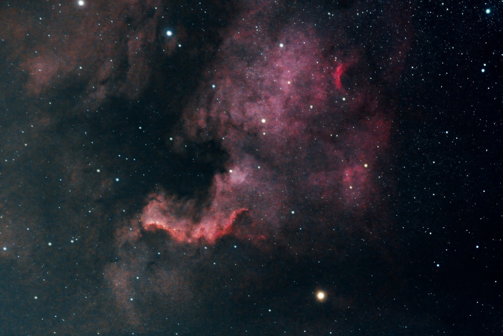 a large star cluster in the middle of a night sky