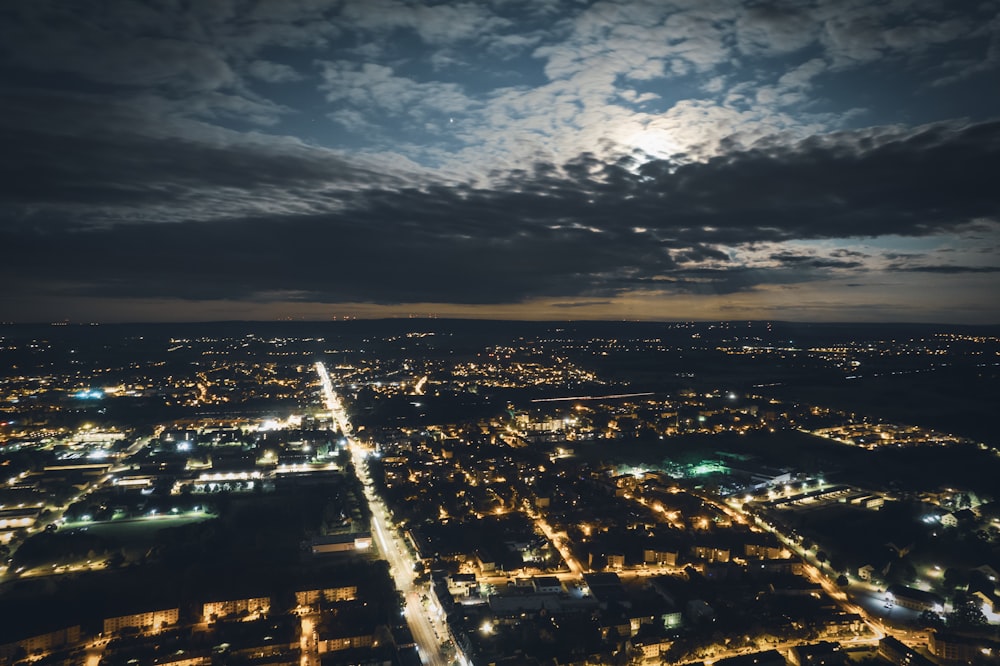 an aerial view of a city at night