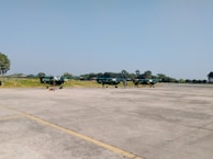 General aviation aircraft parked outside under a clear blue sky, ready for maintenance.