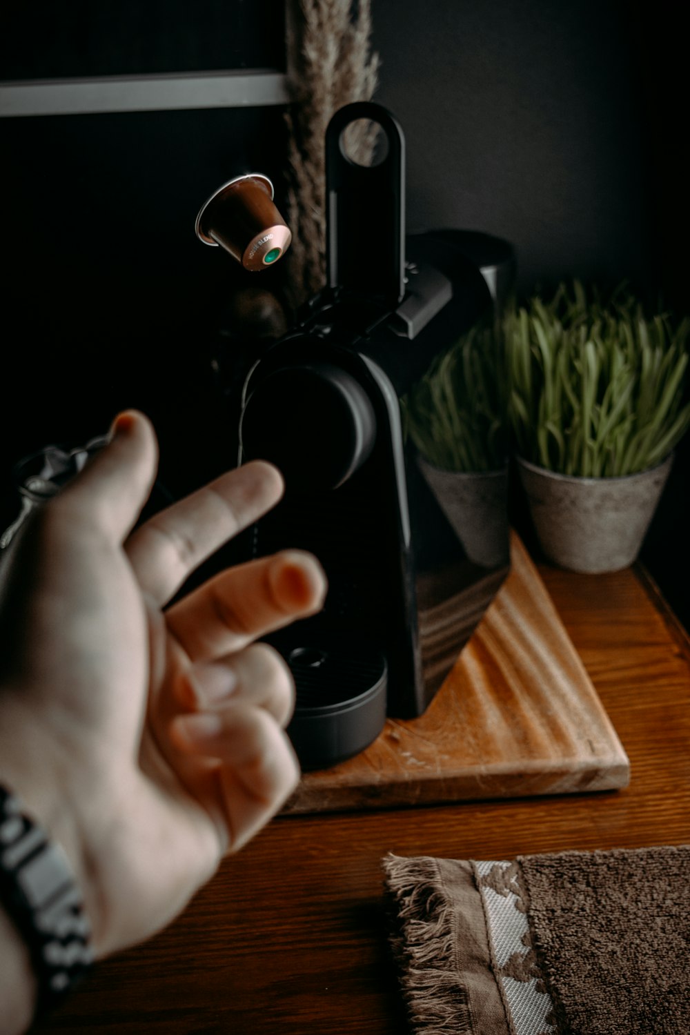 a person holding a camera in their hand