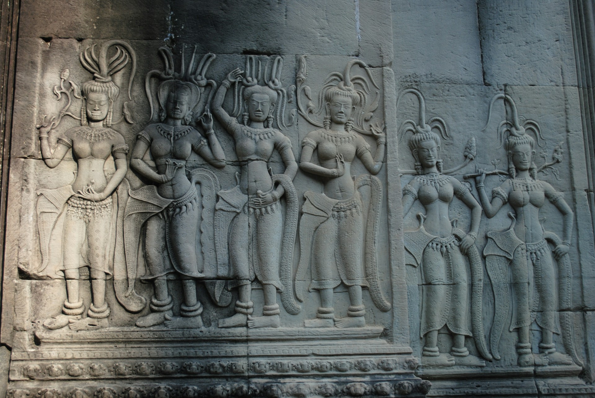 a close up of a carving on the side of a building