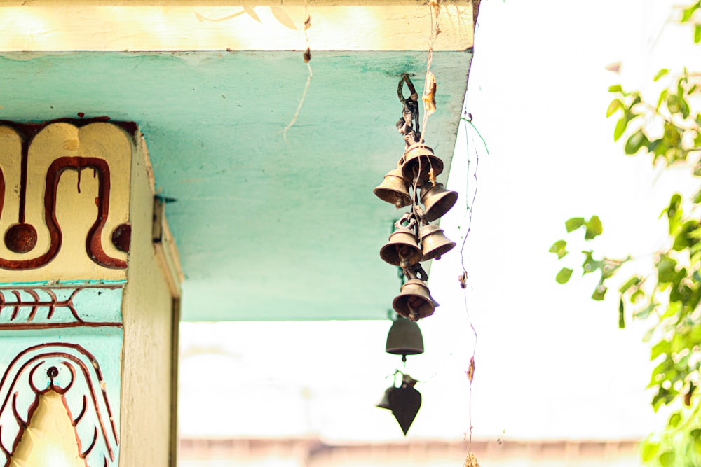 bells hanging from the side of a building