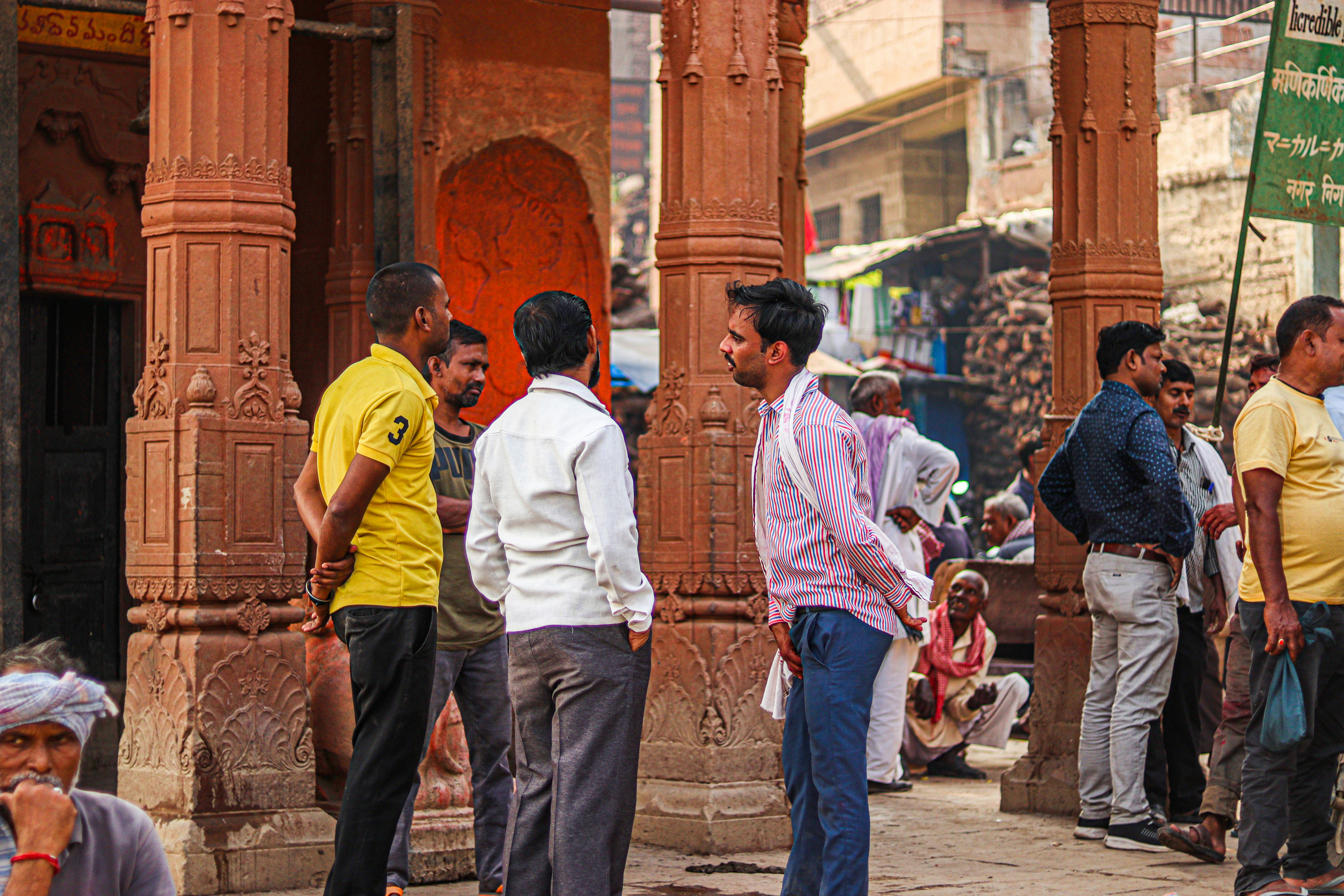 A group of people gathered outside a building.