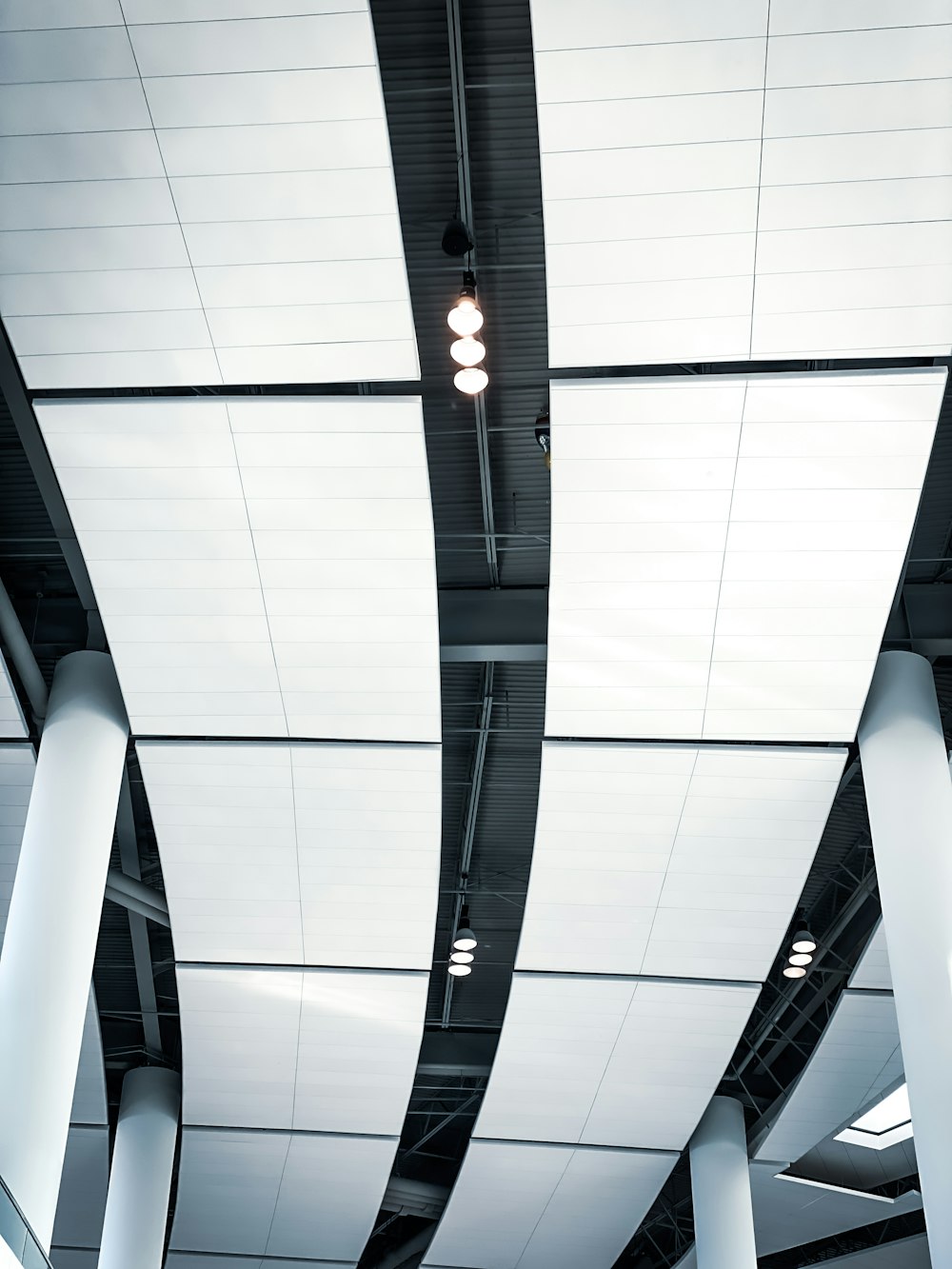 a ceiling that has some lights on it