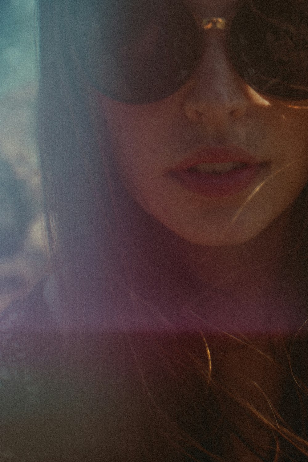 a close up of a person wearing sunglasses