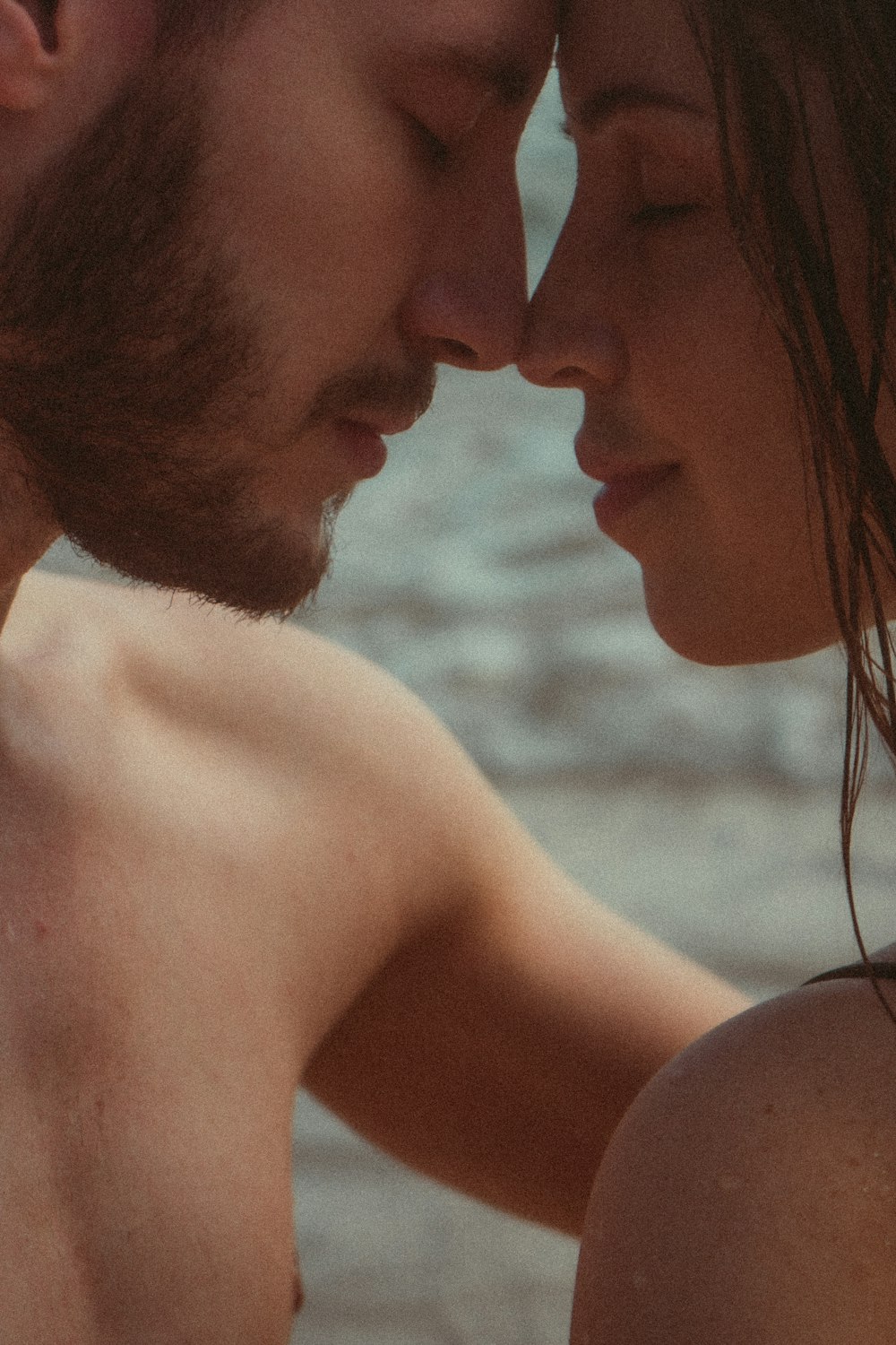 a man and a woman standing next to each other