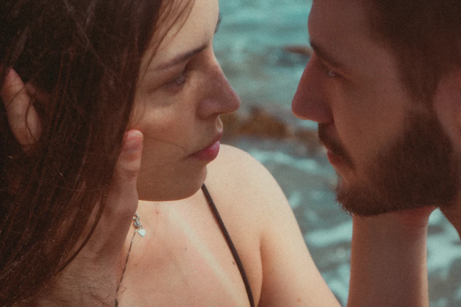 Man and woman looking at each other, real connection