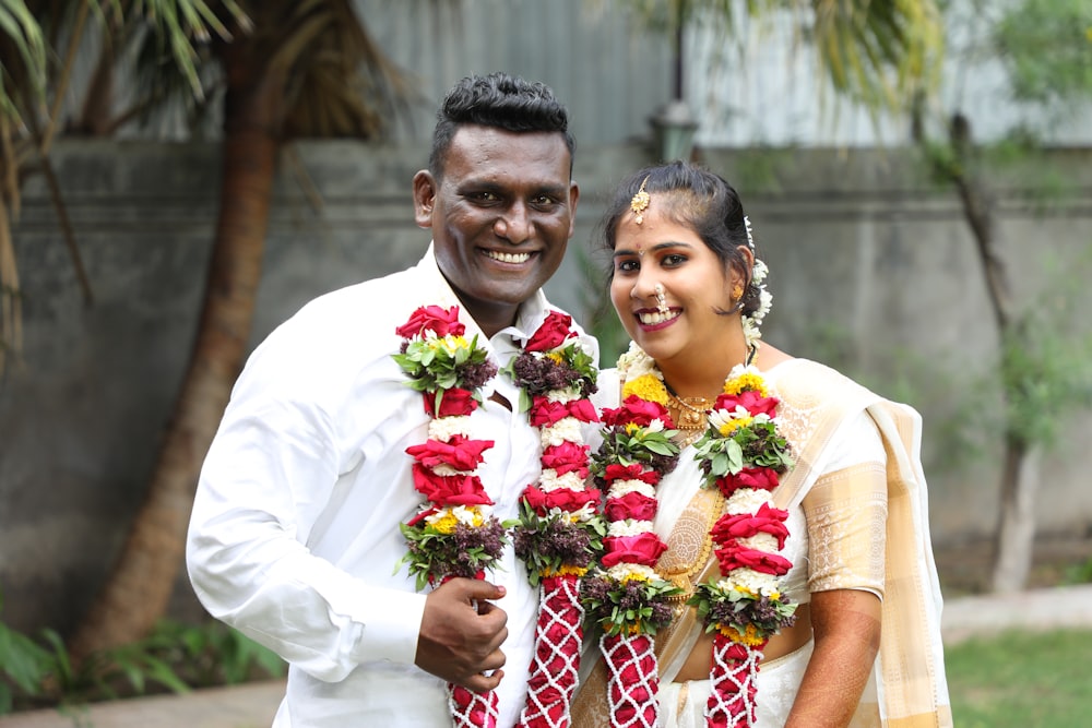 a man and a woman standing next to each other