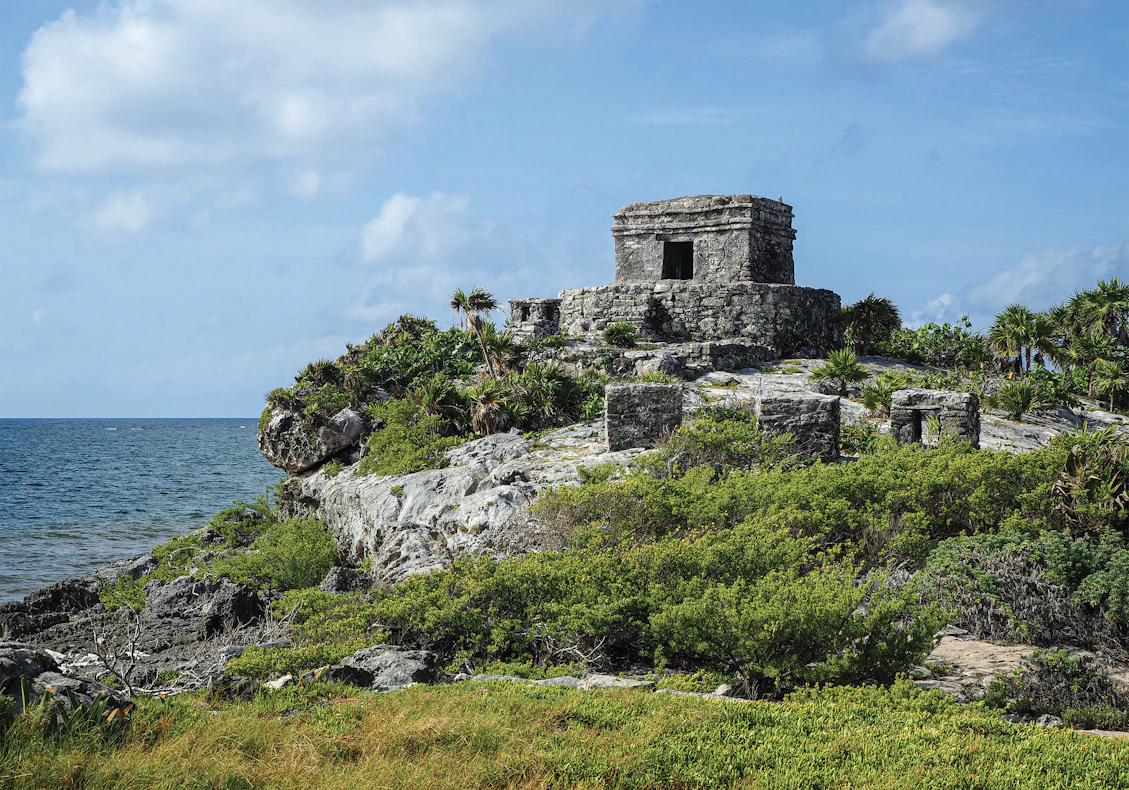 The iconic ancient Mayan ruins of Tulum overlooking the ocean