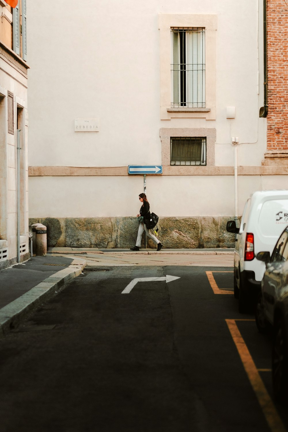 a man riding a skateboard down the middle of a street