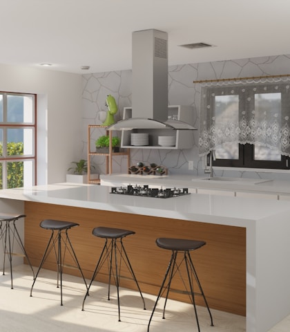 a kitchen with a stove top oven sitting next to a counter