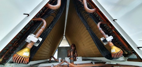 Close-up of industrial pipes and tubes displayed by an exhibitor at the expo.
