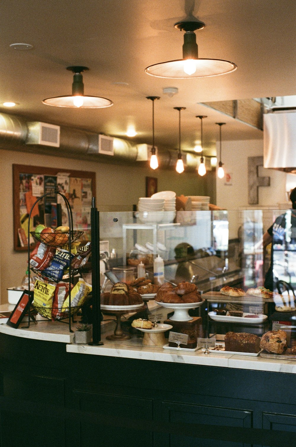 a counter in a restaurant filled with lots of food