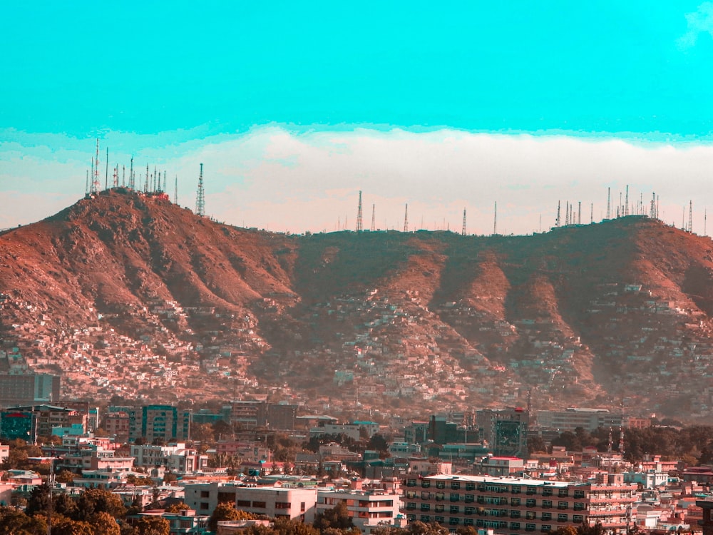 a view of a city with a mountain in the background