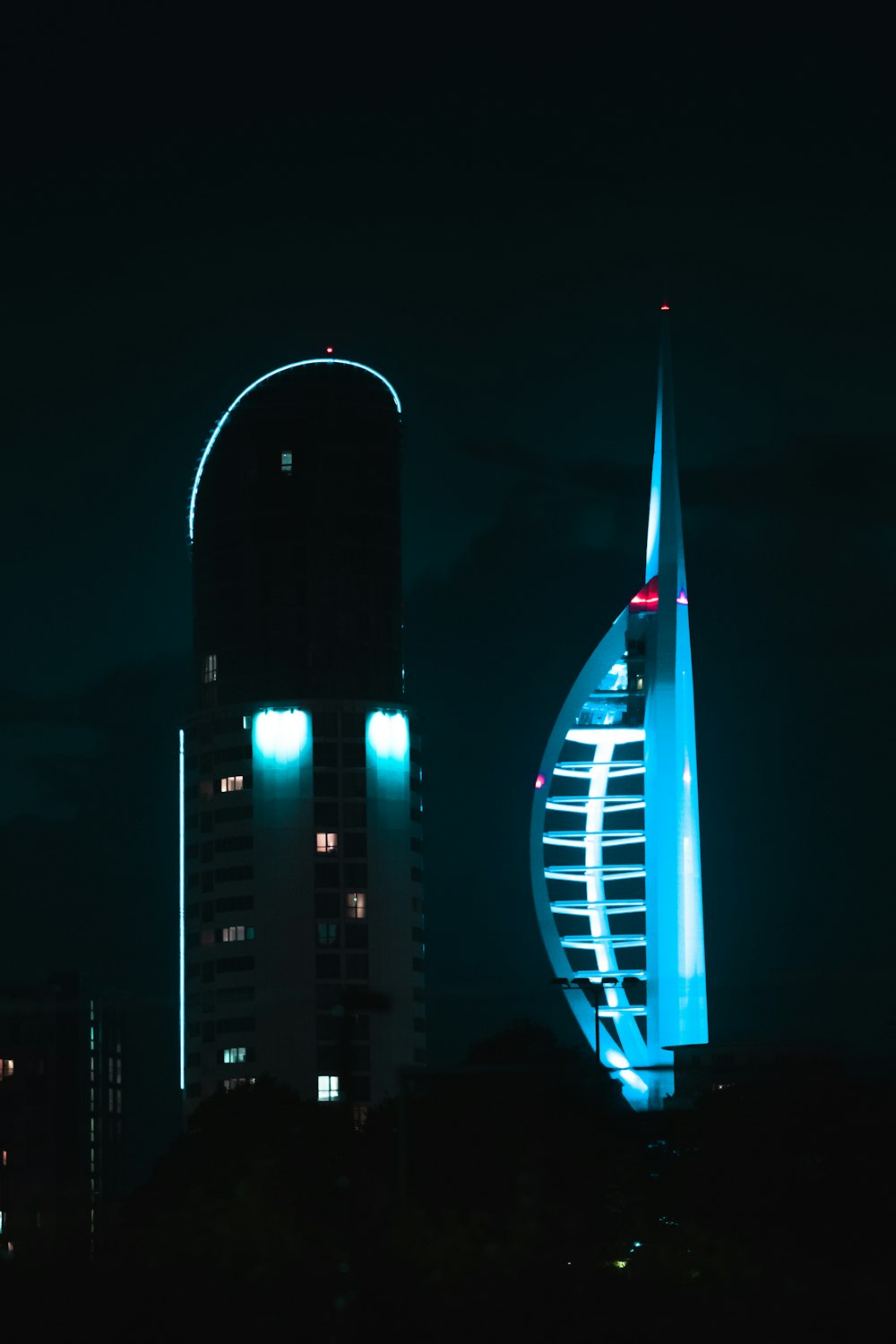 a very tall building lit up at night