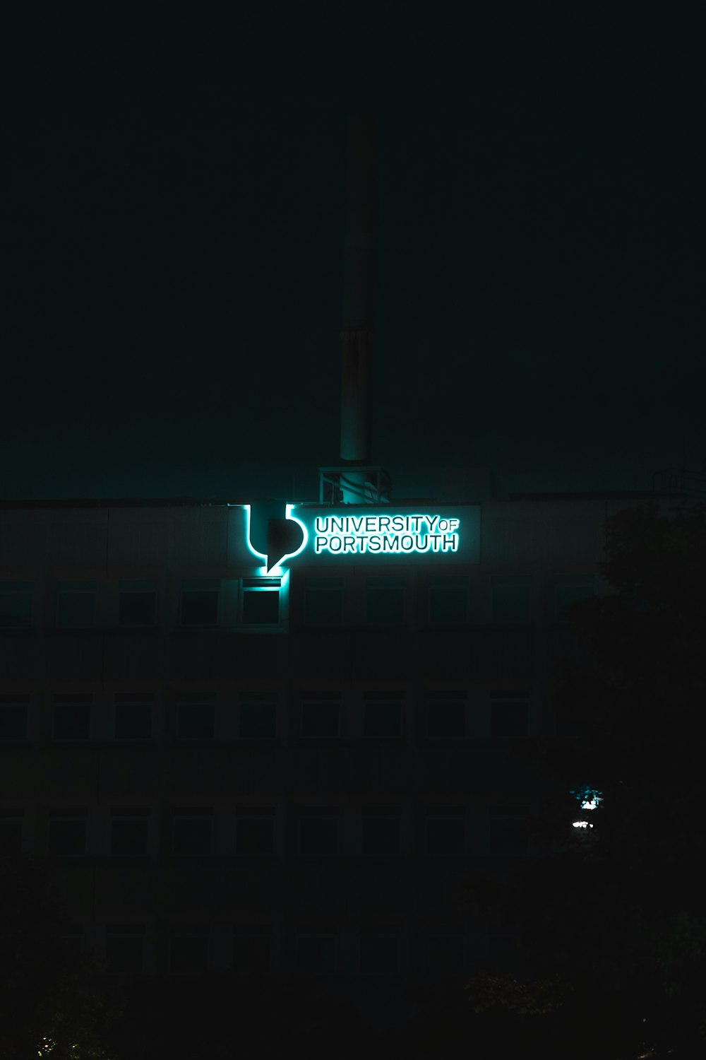 a building with a sign that says university of petroleum