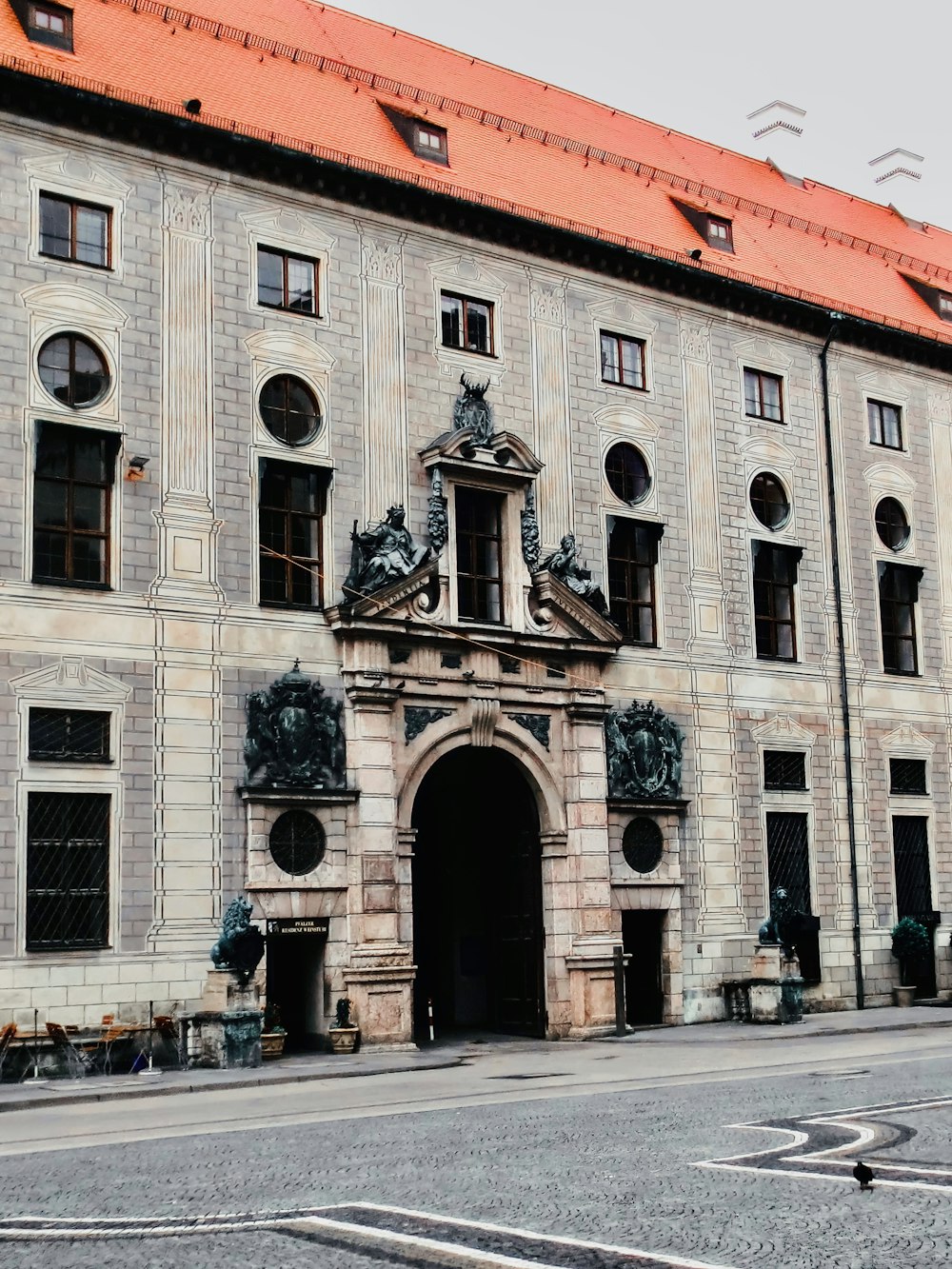 a large building with a clock on the front of it