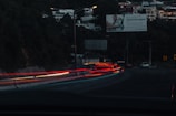 a blurry photo of a city street at night