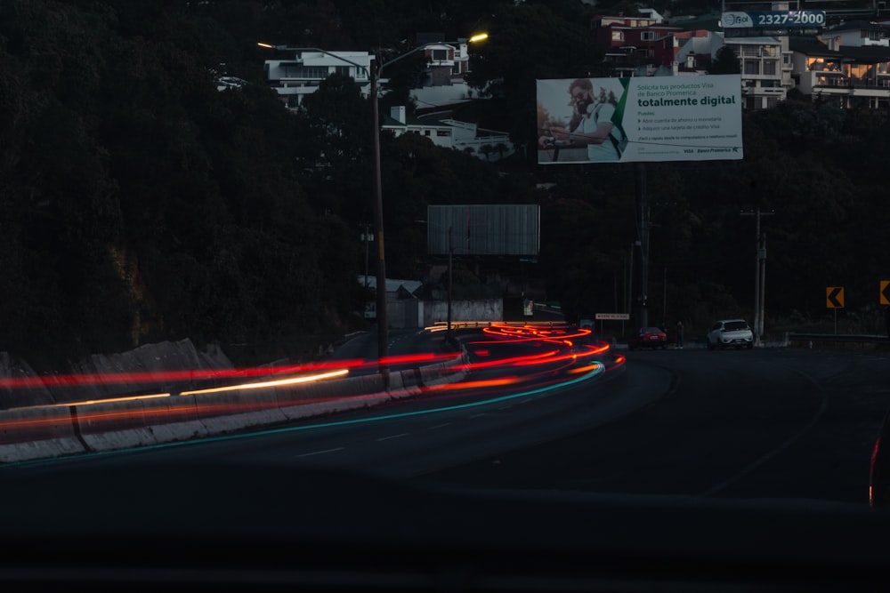 a blurry photo of a city street at night