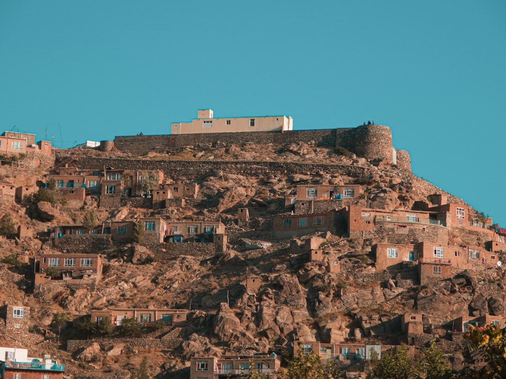 a hill with a bunch of buildings on it