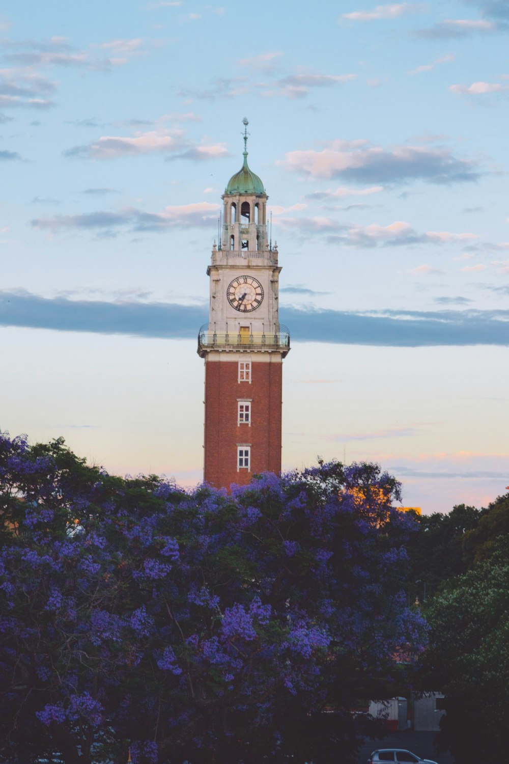 a tall tower with a clock on the top of it