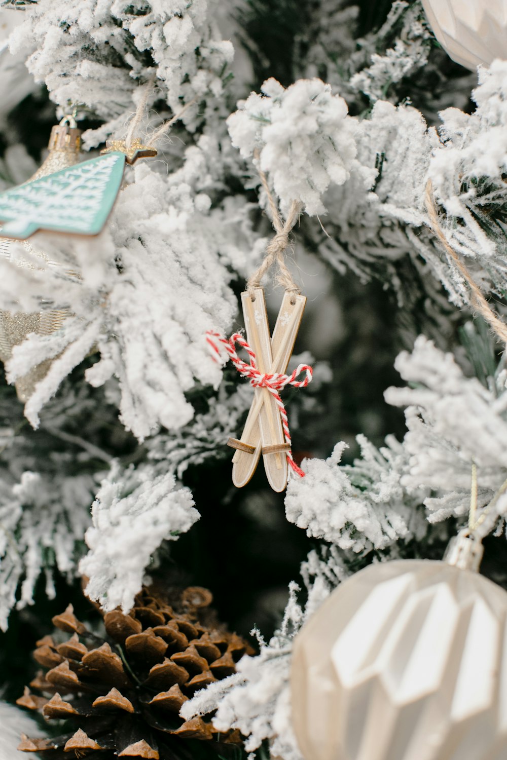 a close up of a christmas tree with ornaments