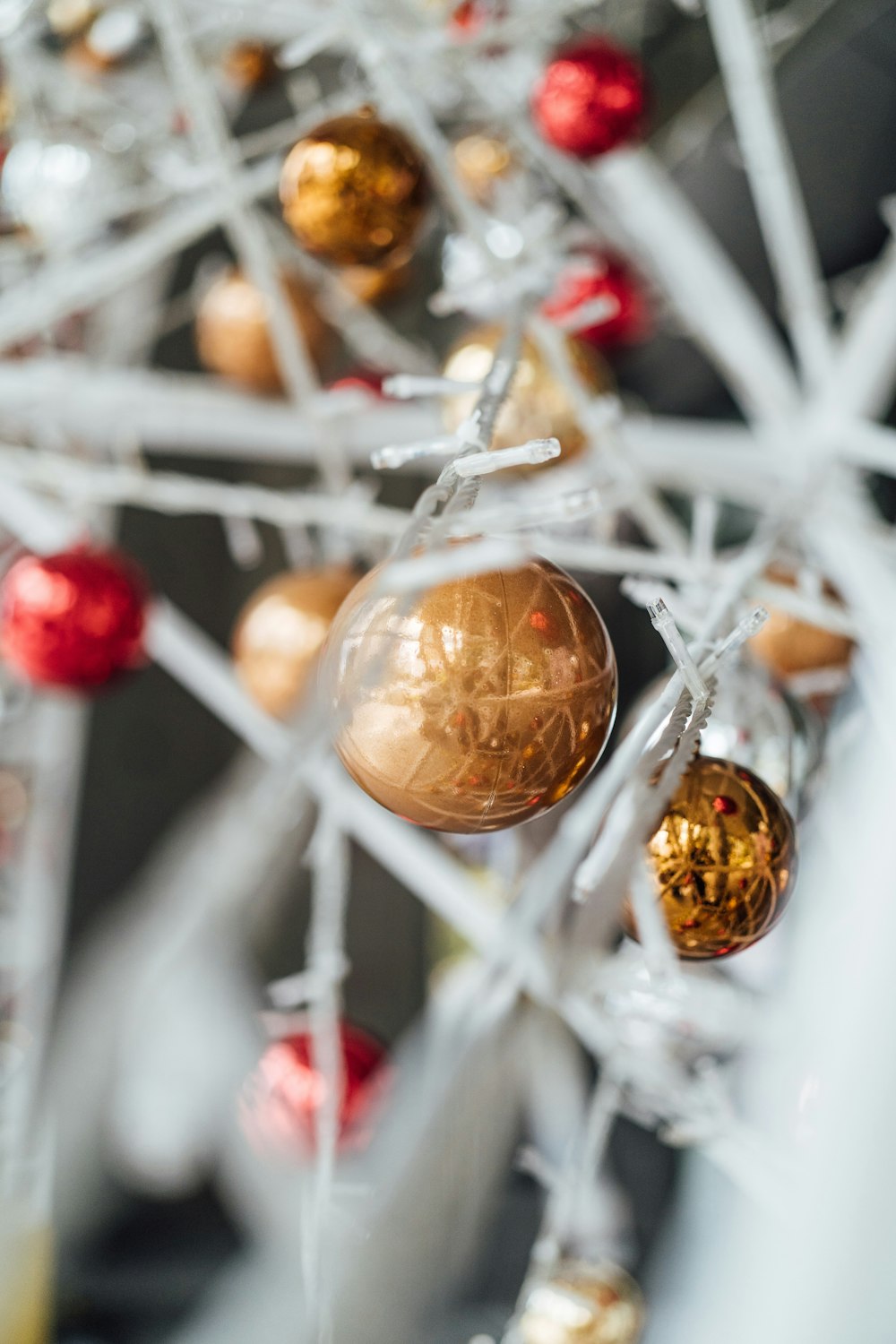 a ferris wheel with ornaments hanging from it