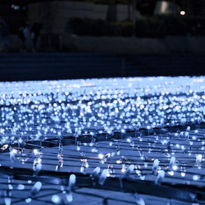 a row of rows of rows of blue lights
