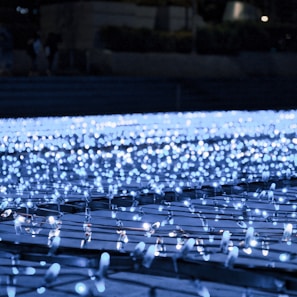 a row of rows of rows of blue lights