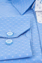 a close up of a blue shirt with buttons