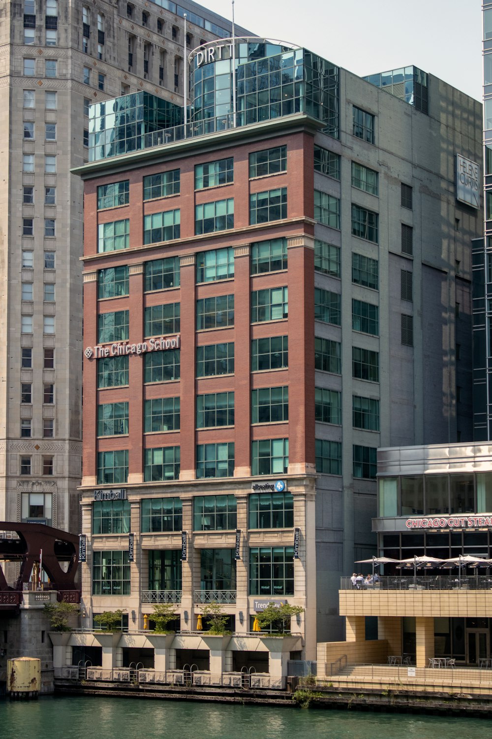 a large building next to a body of water