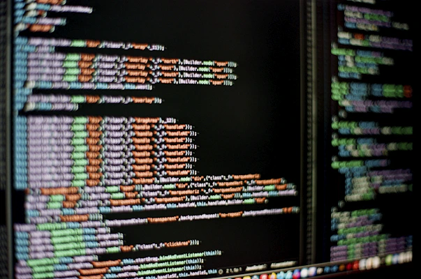 Source code displayed on multiple monitors