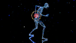 a man with a red ball in his hand