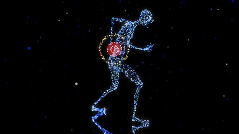 a man with a red ball in his hand