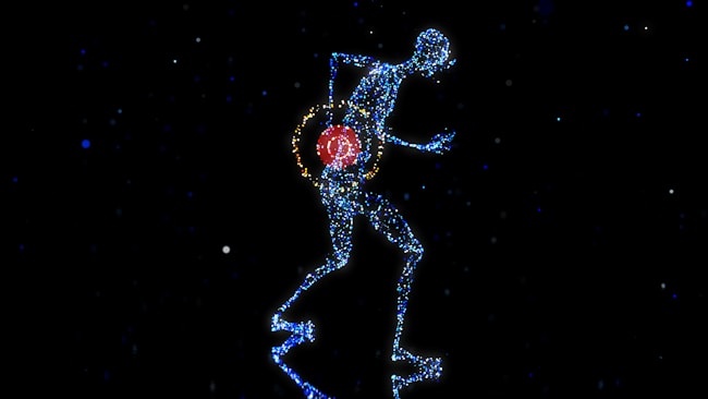 a man with a red ball in his hand