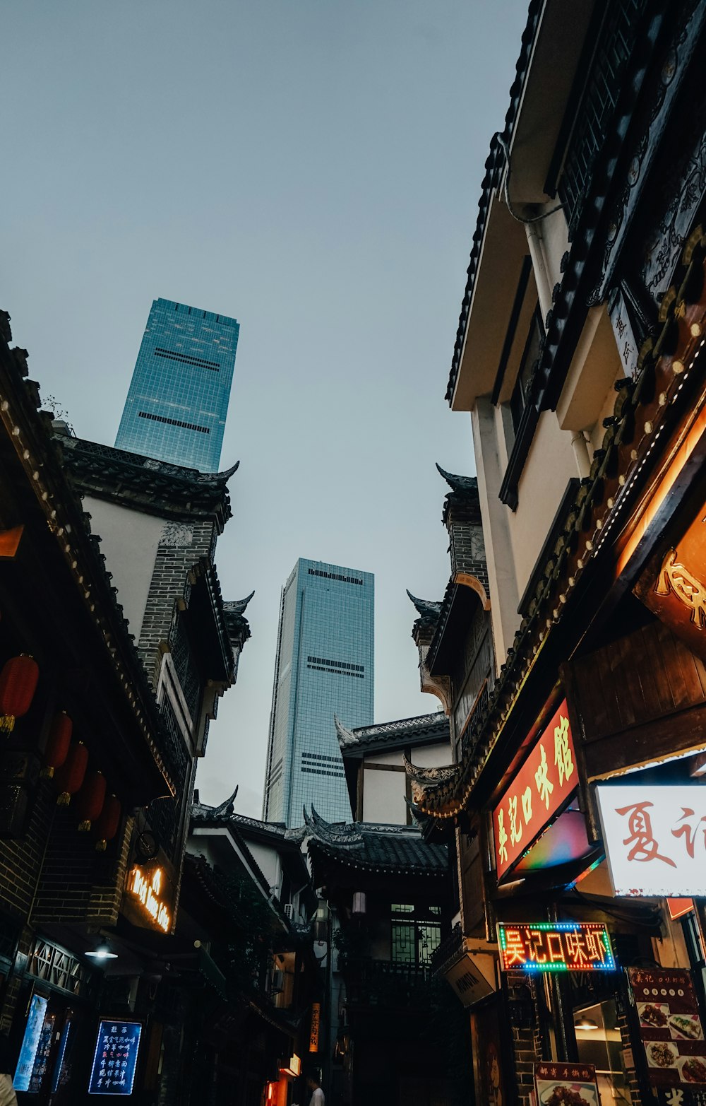 a city street filled with lots of tall buildings