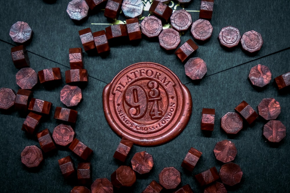 a wax stamp surrounded by small pieces of wood
