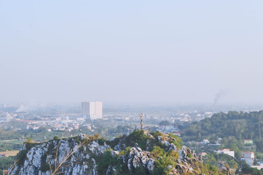 a view of a city from the top of a hill