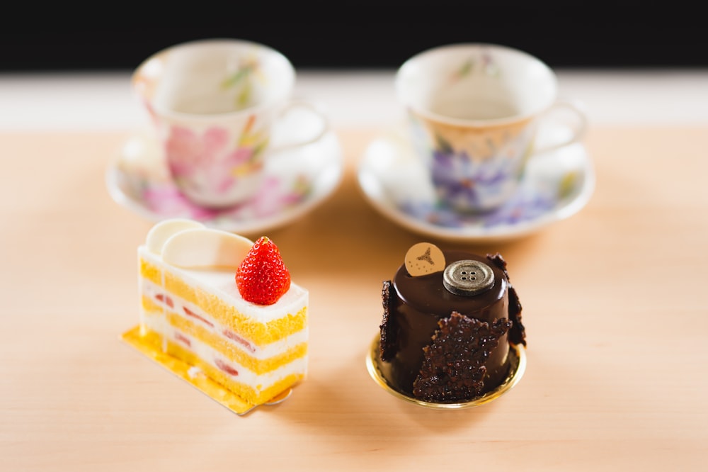 a miniature cake and a piece of cake on a table