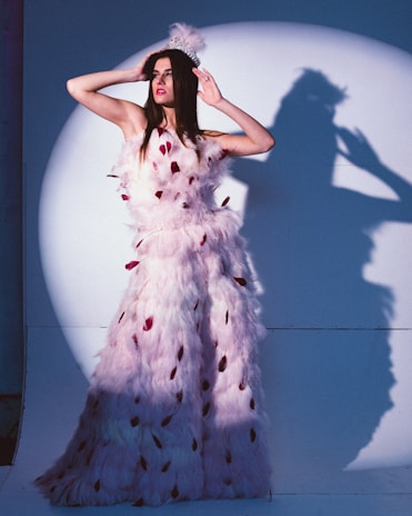 Regal Rhythm posing elegantly in a Maria Antoinette-style gown with a modern twist, set against a British royal palace backdrop.