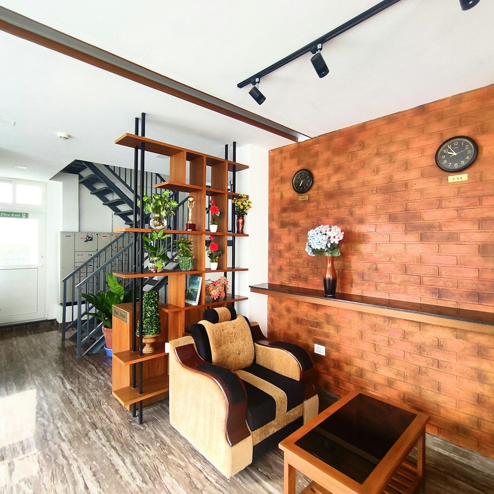 a living room filled with furniture and a staircase