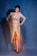 a woman in a dress posing for a picture