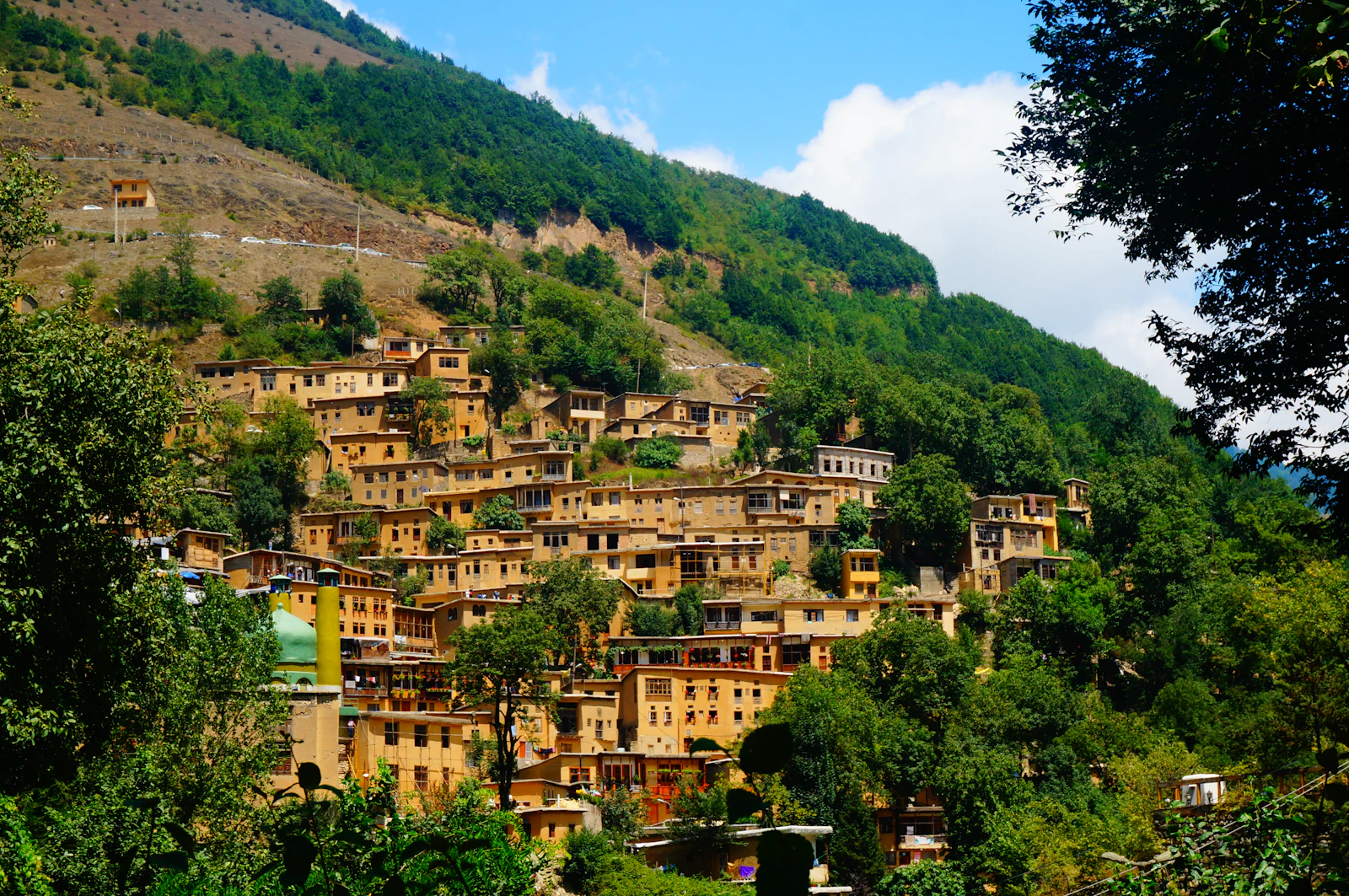 The stepped houses of the village on the hillside — Masuleh, Iran