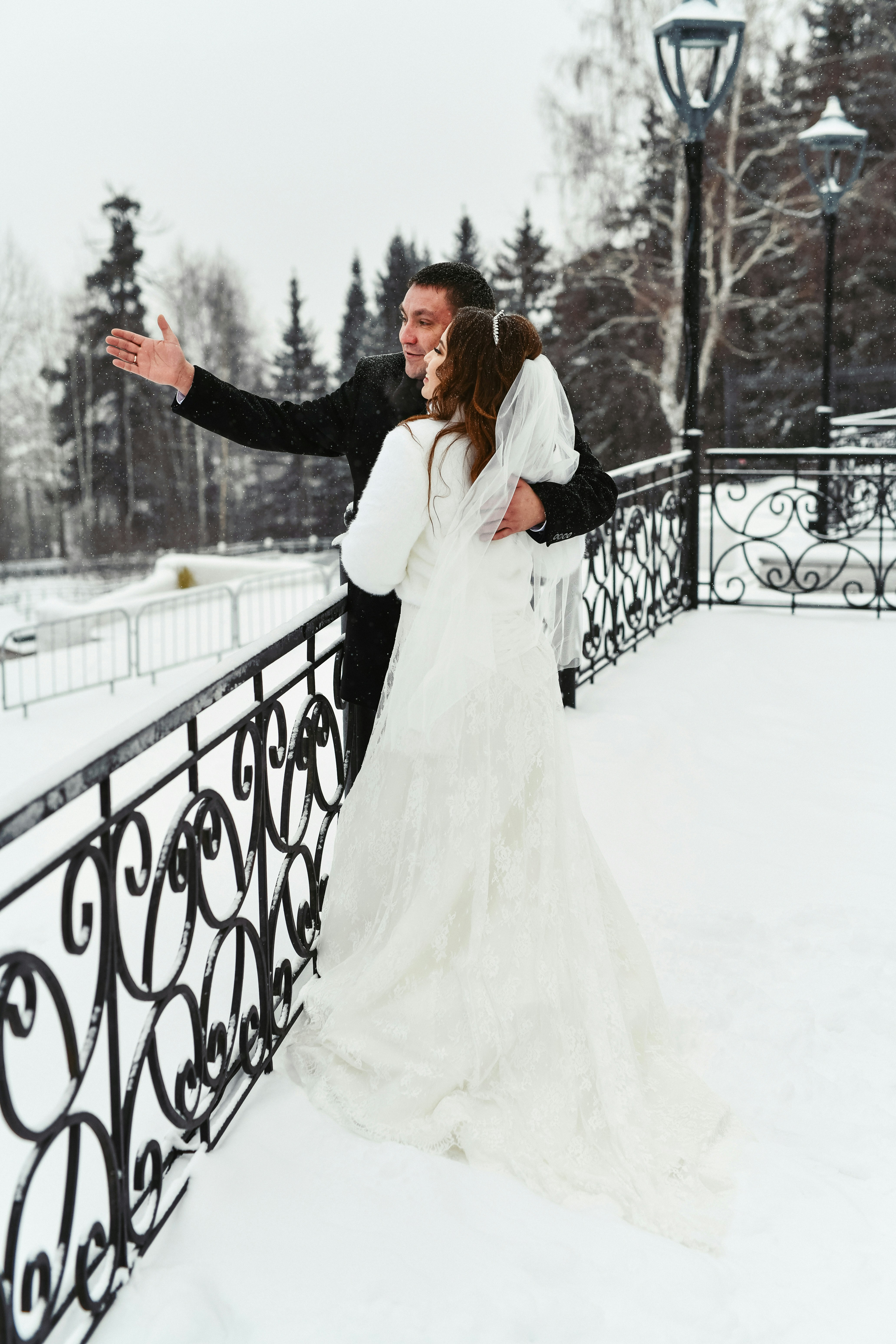 a person that is standing in the snow