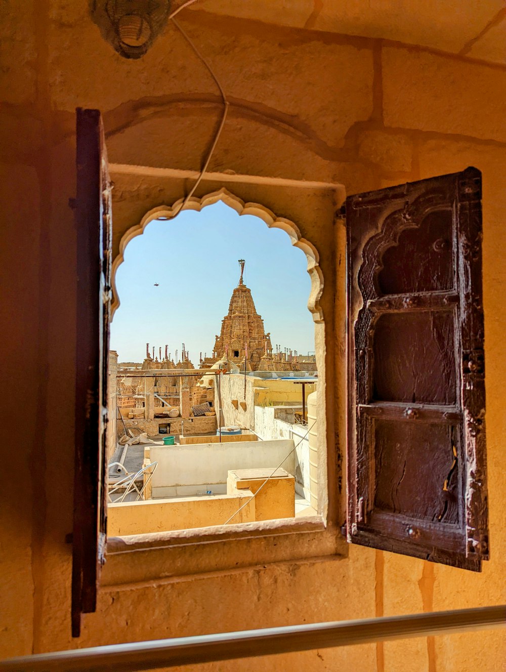 a window with a view of a city