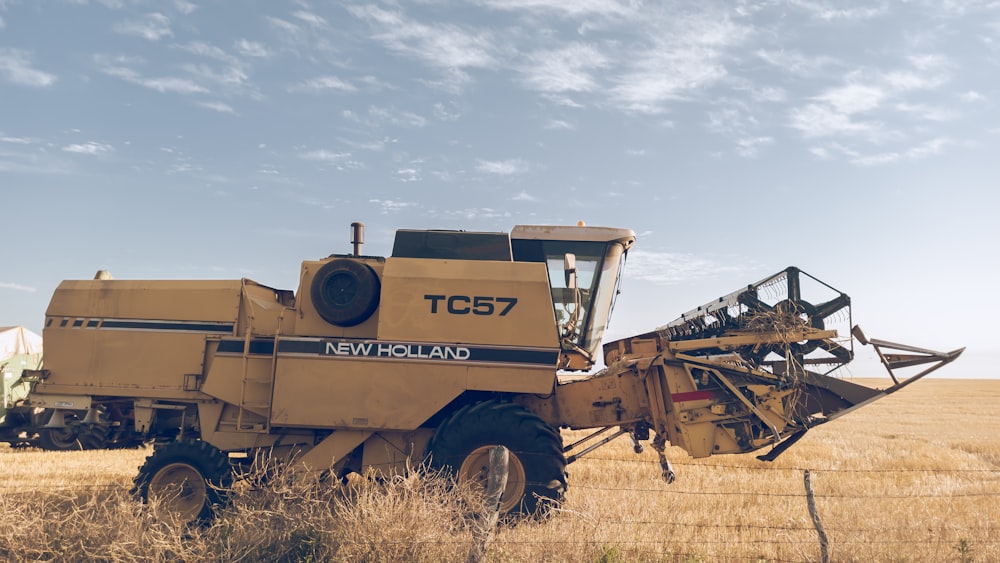 a tractor is parked in the middle of a field