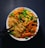 A bowl filled with instant noodles topped with a colorful array of vegetables, including sliced carrots, green bell peppers, peas, and corn. The dish is neatly arranged, with chopsticks resting on the side, creating a visually appealing and appetizing meal.