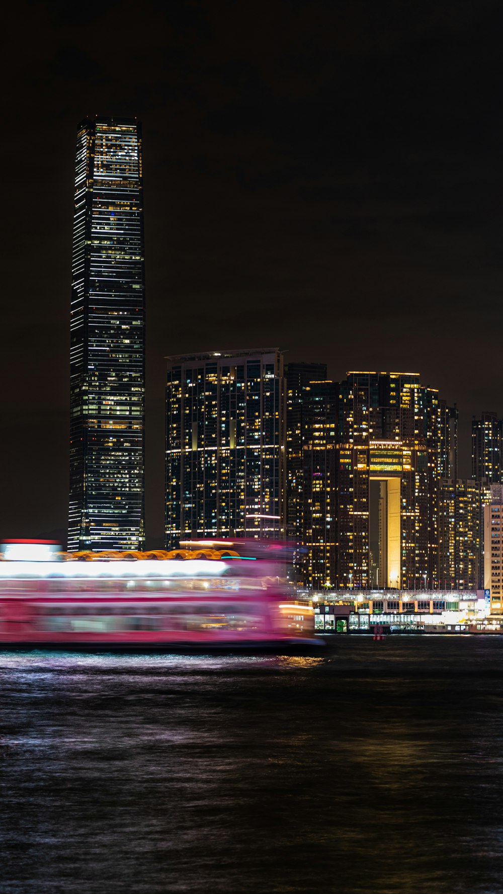 a long exposure photo of a city at night